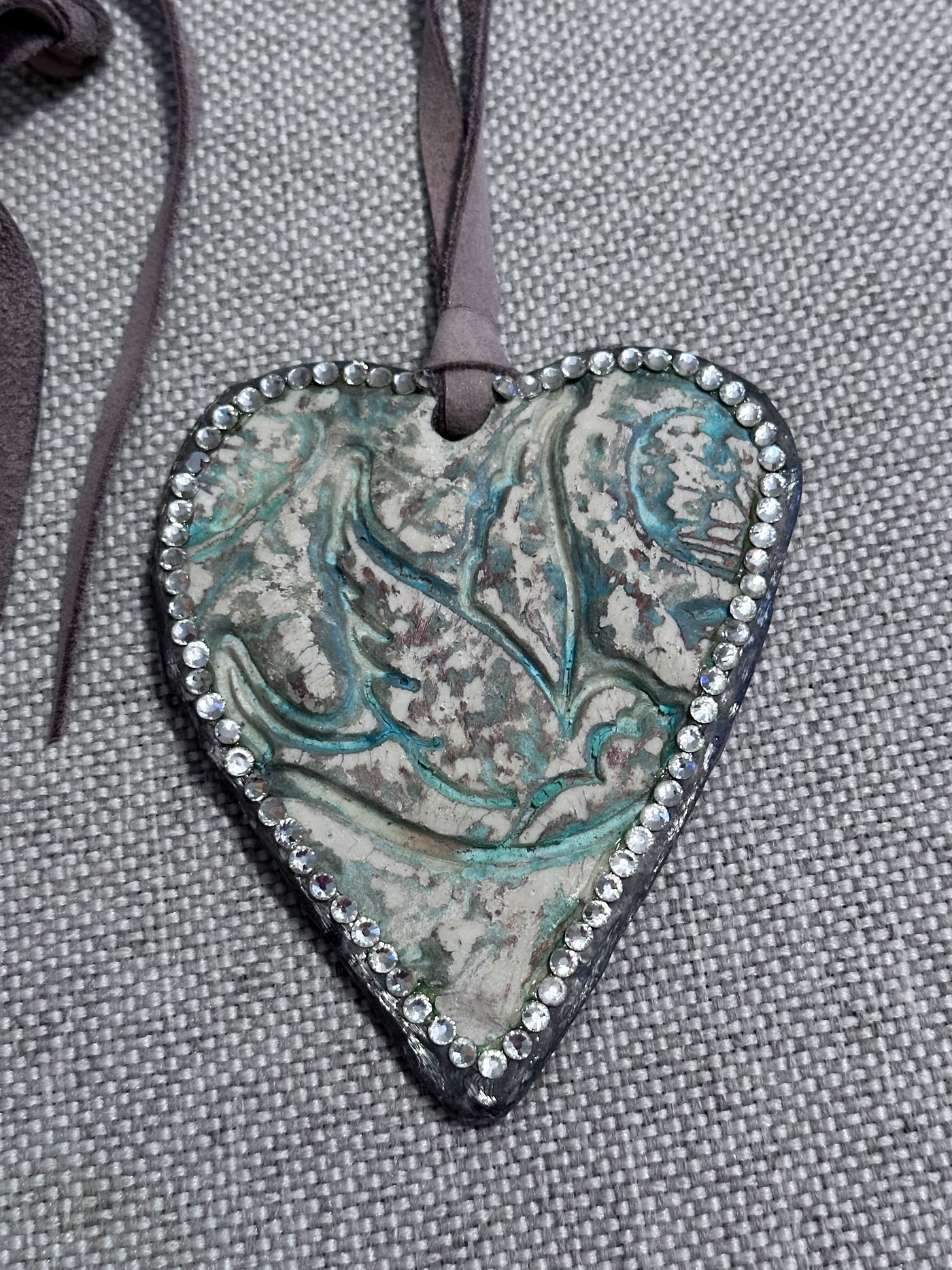 Hand Carved Heart Bird Necklace